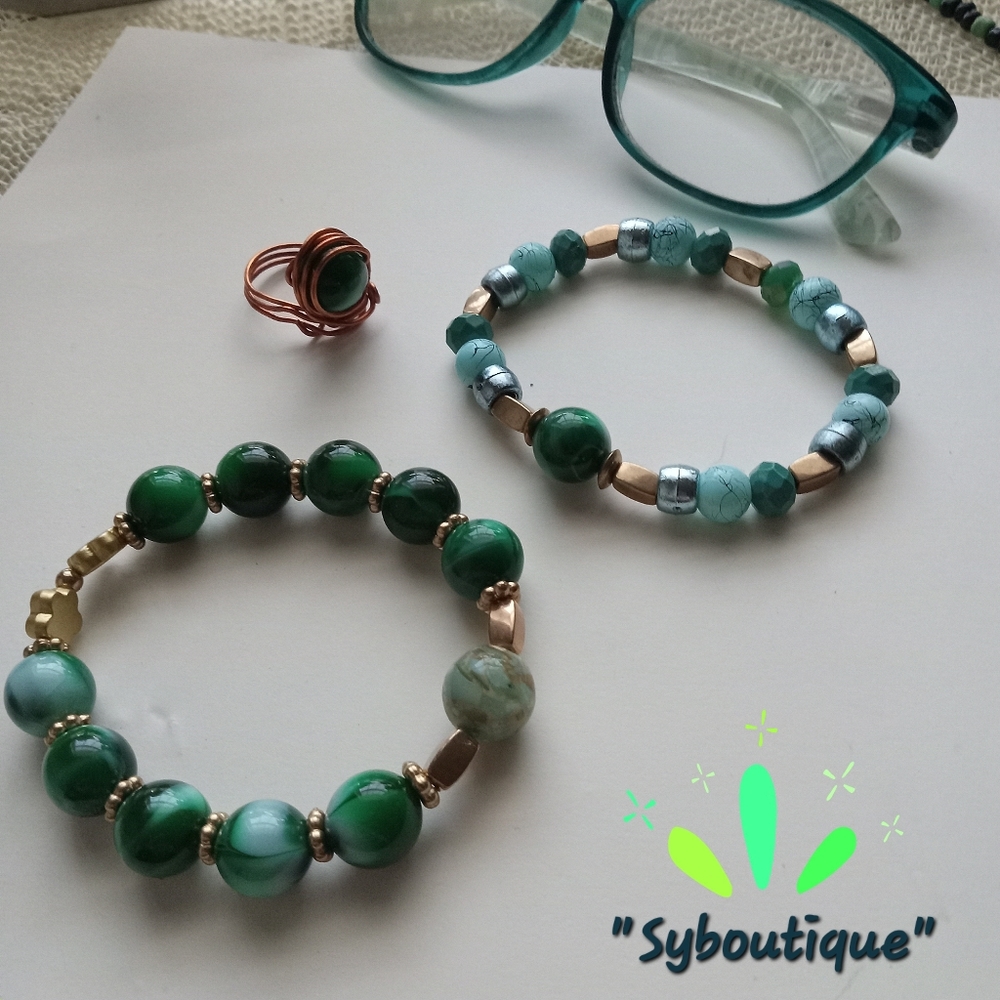 Matching stretch bracelets and hand made wire wrapped matching. beaded ring.